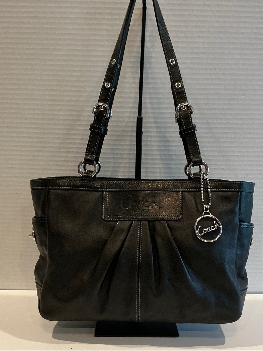 Coach Black Leather Shoulder Bag with Silver Charm
